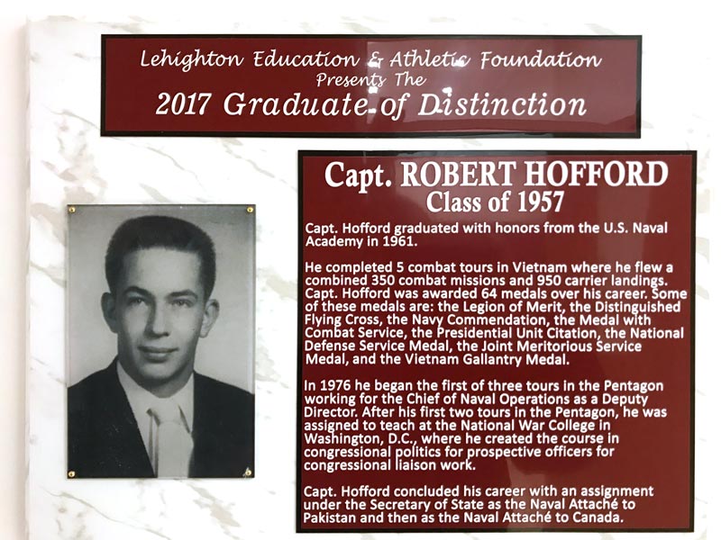 A plaque honoring Hofford, containing the same text as above.